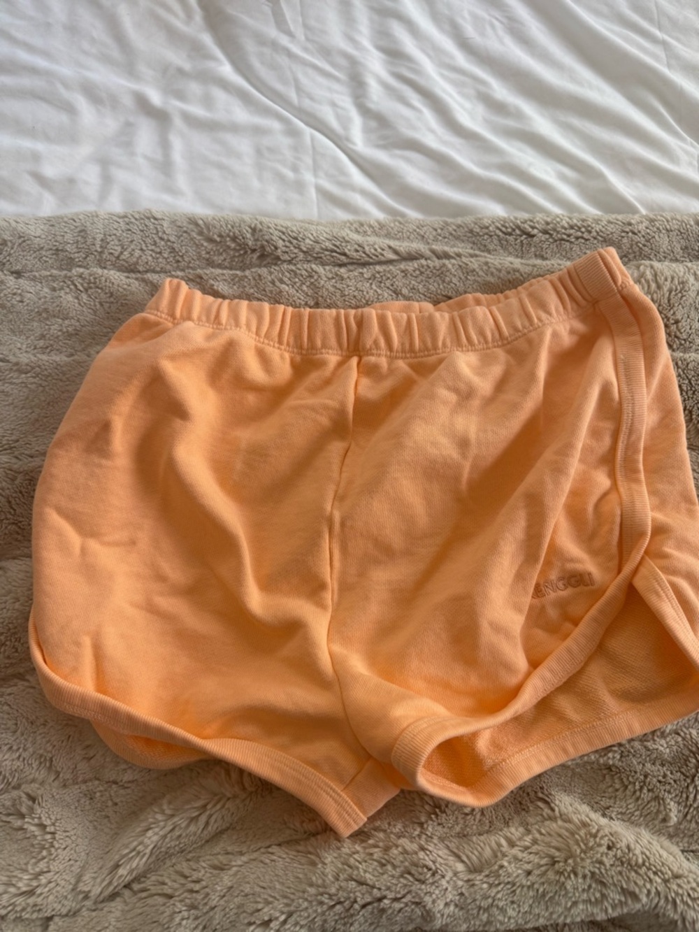 Renggli Peach terry Shorts never worn. Size L.